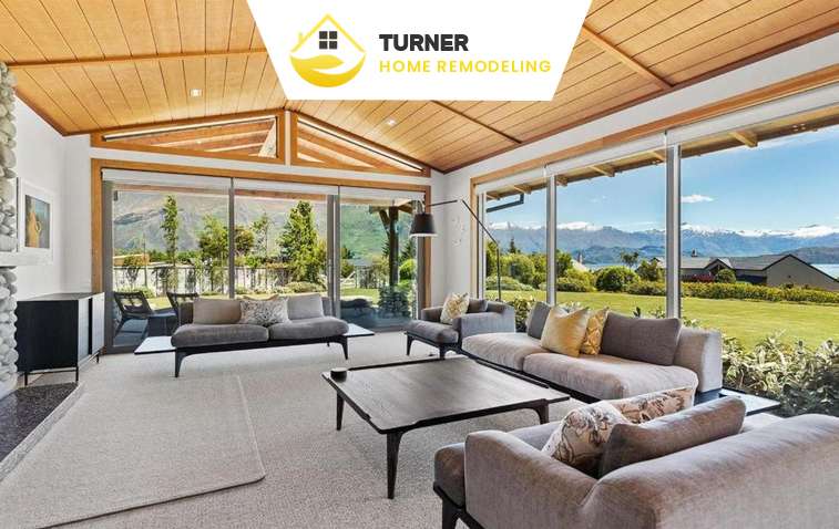 Spacious family room addition featuring modern furniture and natural light.